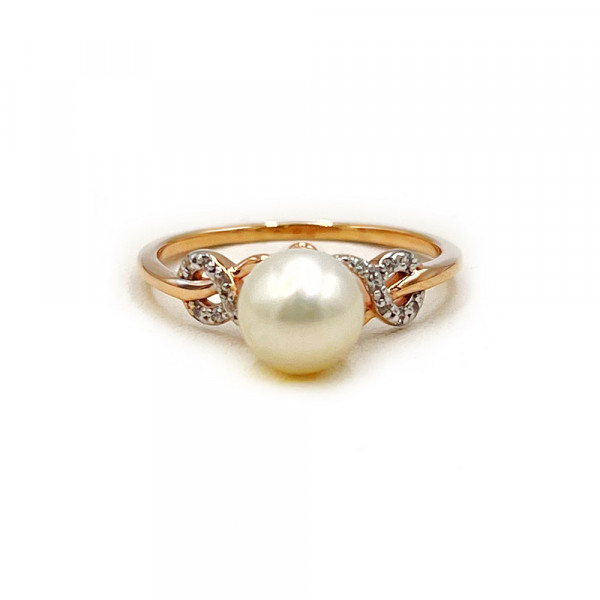 Кольцо из золота красного с белым цвета с цирконом