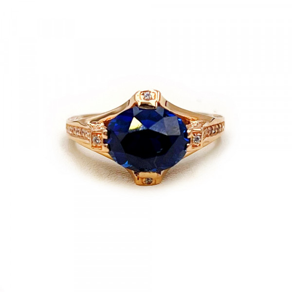 Каблучка з золота червоного кольору з цирконом