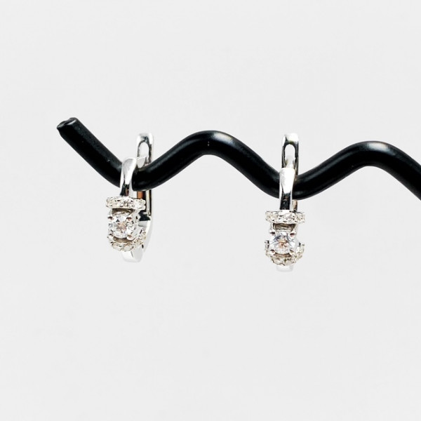 Золоті сережки з білими діамантами