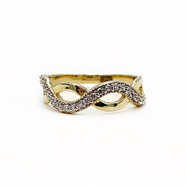 Золотое кольцо в желтом с белым цвете с цирконом