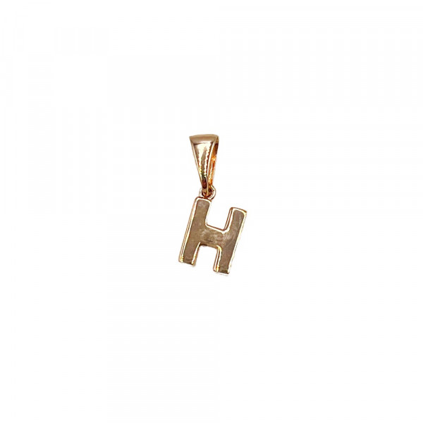 Золотий кулон червоного кольору