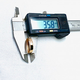 Золота обручка з жовтими діамантами