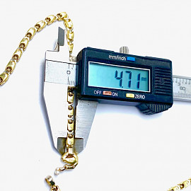 Золотая цепочка желтого с белым цвета с желтыми бриллиантами