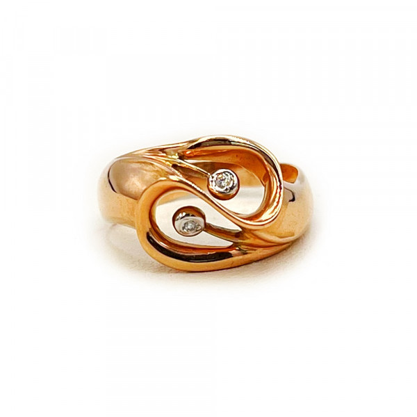 Кольцо из красного с белым золота с цирконом